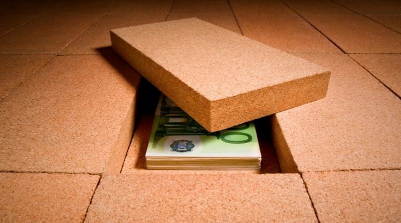 money-hidden-under-a-brick